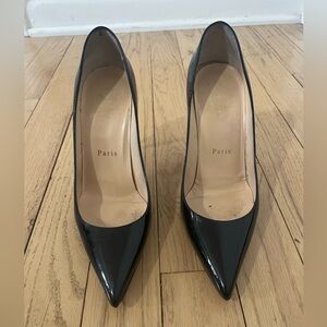 Christian Louboutin Pigalle Follies 100MM Black Patent pumps